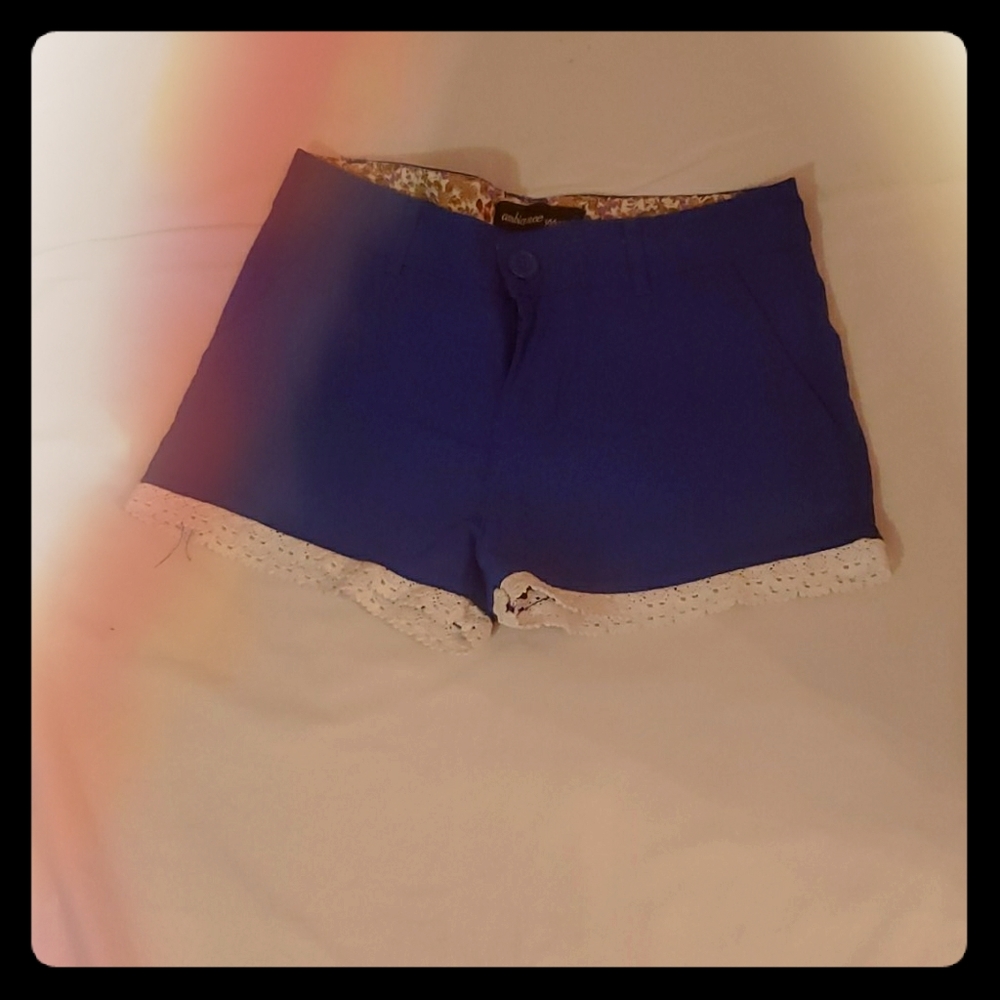 Blue shorts with lace trim slightly used